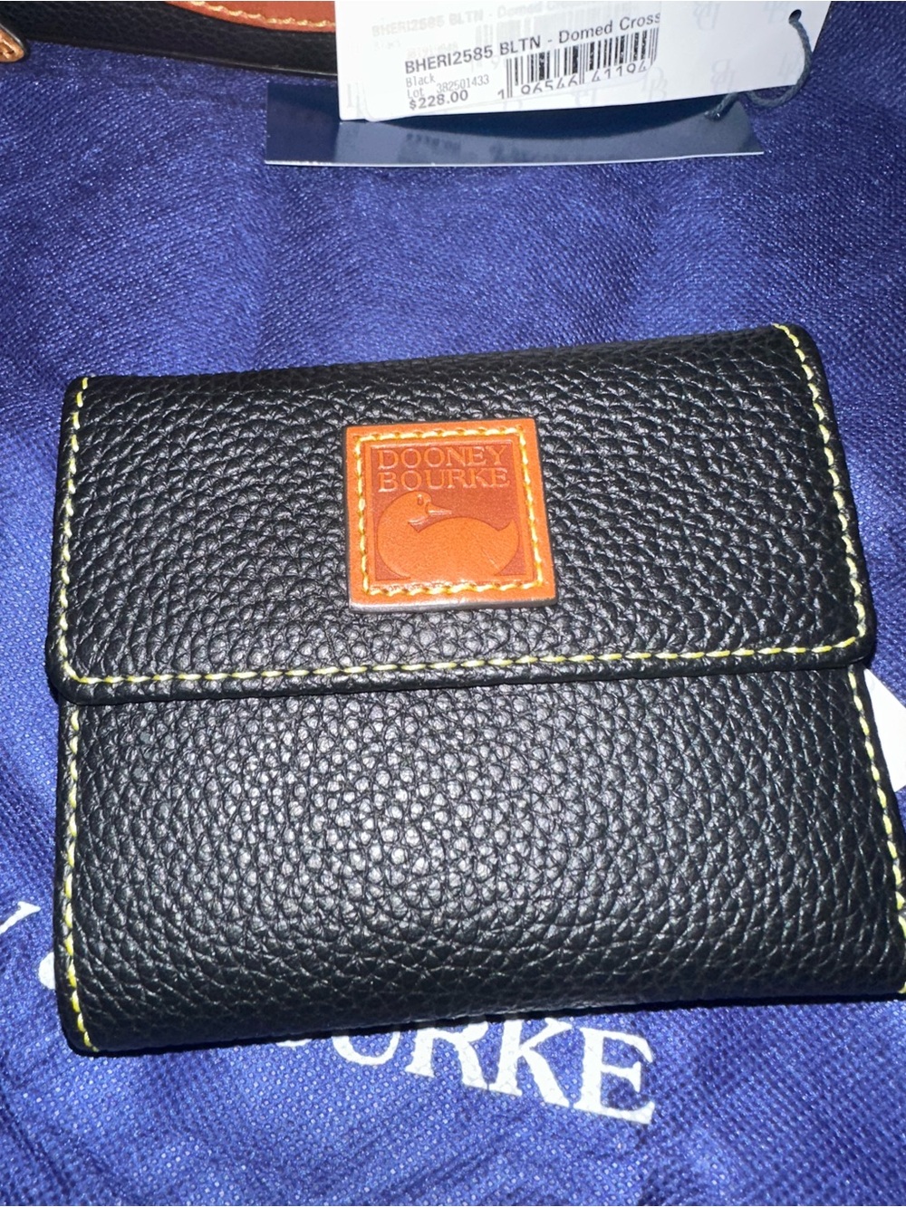 New with tags Dooney & Bourke Black Leather Card Wallet with Tan Logo Patch
